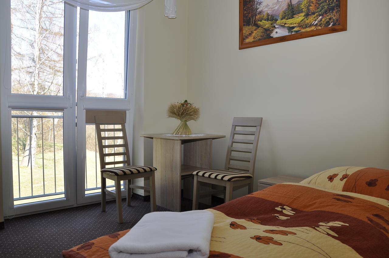 Hôtel Osrodek Rekreacyjno - Wypoczynkowy Beskidek à Gilowice  Chambre photo